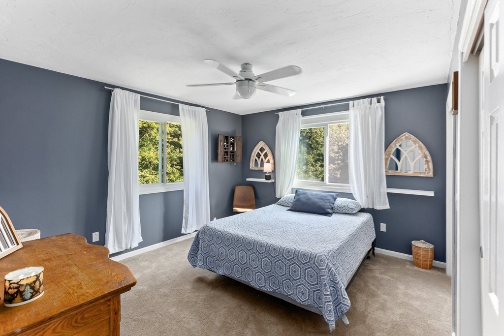 3 Forest Park Drive Mendon, MA 01756 - Photo 14 of 22 a bedroom with a bed and a window