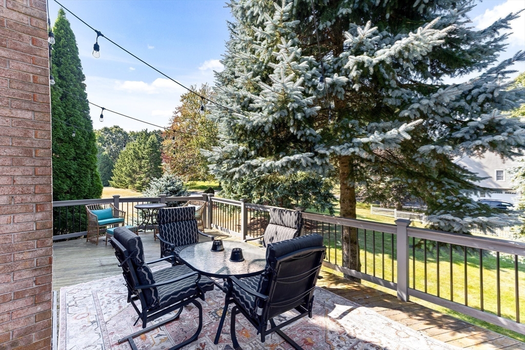 3 Forest Park Drive Mendon, MA 01756 - Photo 18 of 22 a view of a chairs and table in the balcony