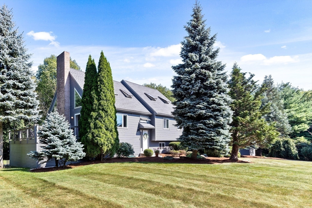 3 Forest Park Drive Mendon, MA 01756 - Photo 2 of 22 a view of a house with a yard