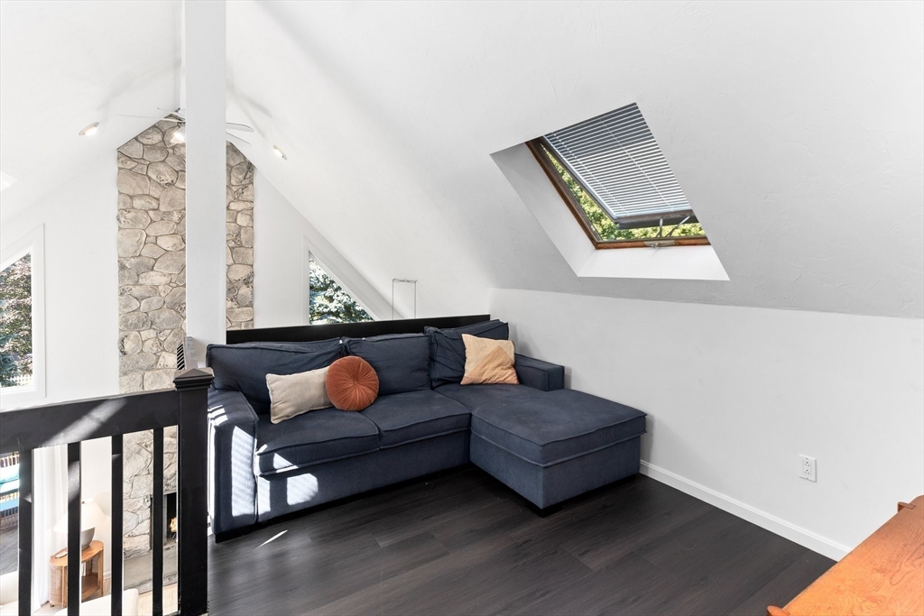 3 Forest Park Drive Mendon, MA 01756 - Photo 9 of 22 a living room with furniture and stairs