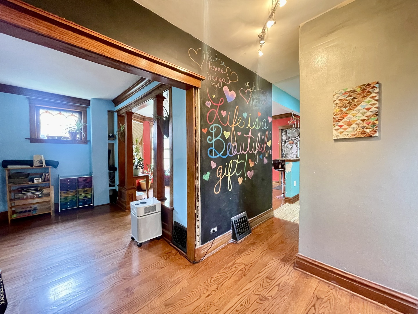 7916 South Constance Avenue Chicago, IL 60617 - Photo 16 of 28 a view of a hallway with workspace and a window