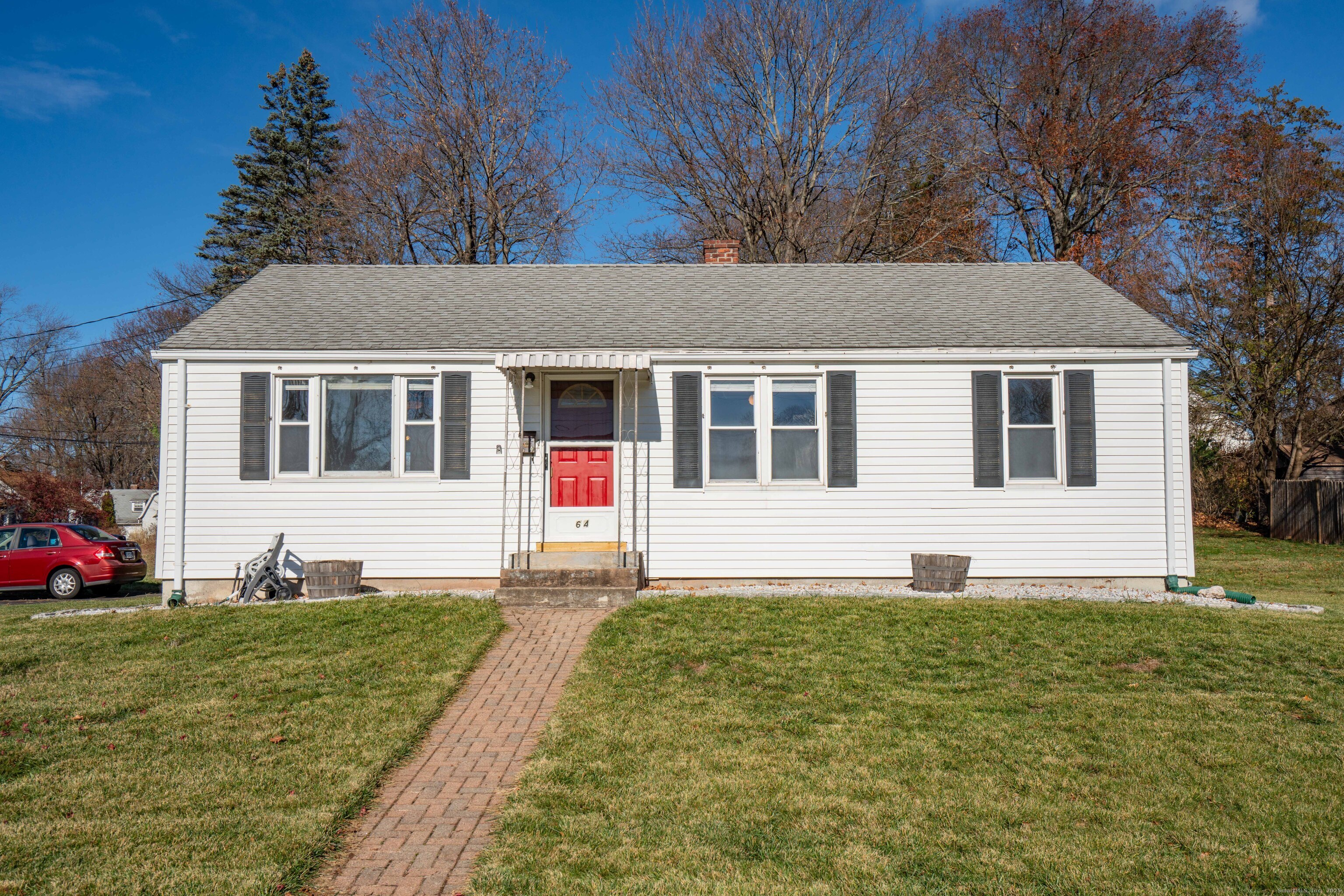 a front view of a house with a yard