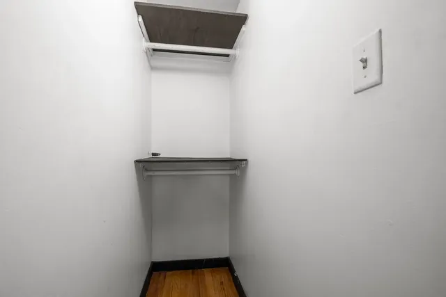 a view of small space with racks on the wall