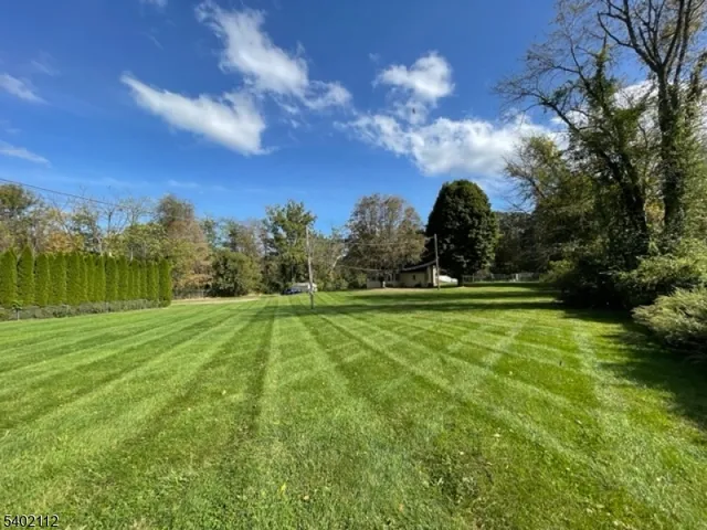 a view of a golf course with a lake