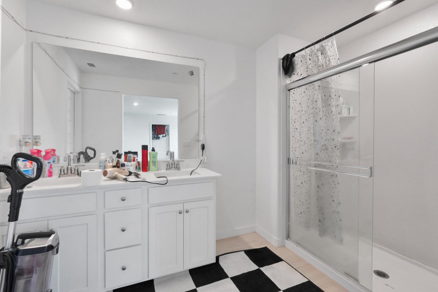 7041 Overlook Way Stockton, CA 95219 - Photo 13 of 31 a bathroom with a sink and a mirror
