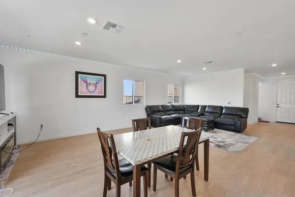 a view of a dining room with furniture