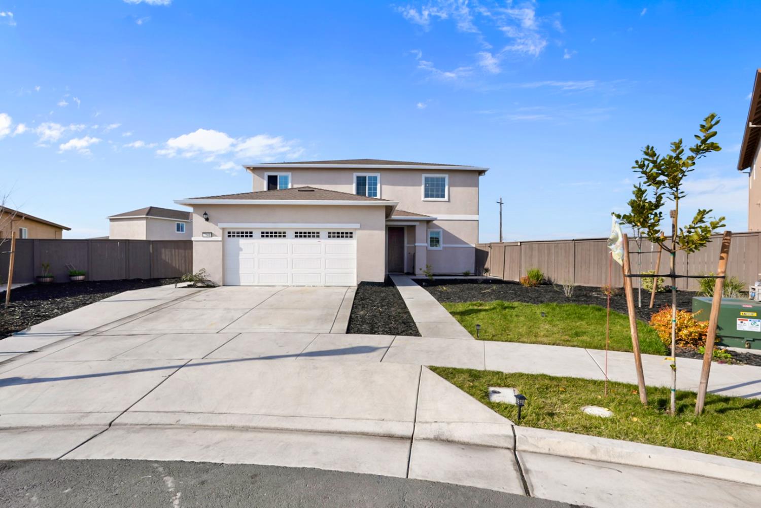 7041 Overlook Way Stockton, CA 95219 - Photo 31 of 31 a front view of a house with garden