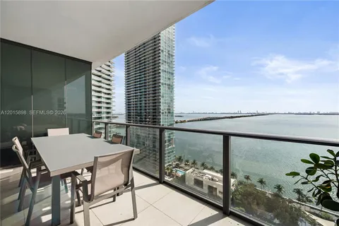 a view of a balcony with chairs
