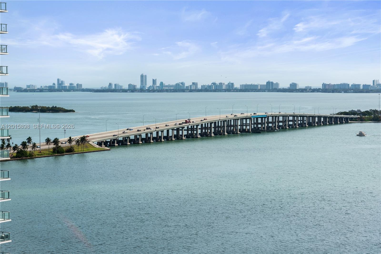 480 Northeast 31st Street, Unit 1802 Miami, FL 33137 - Photo 14 of 50 a view of a lake with houses in background