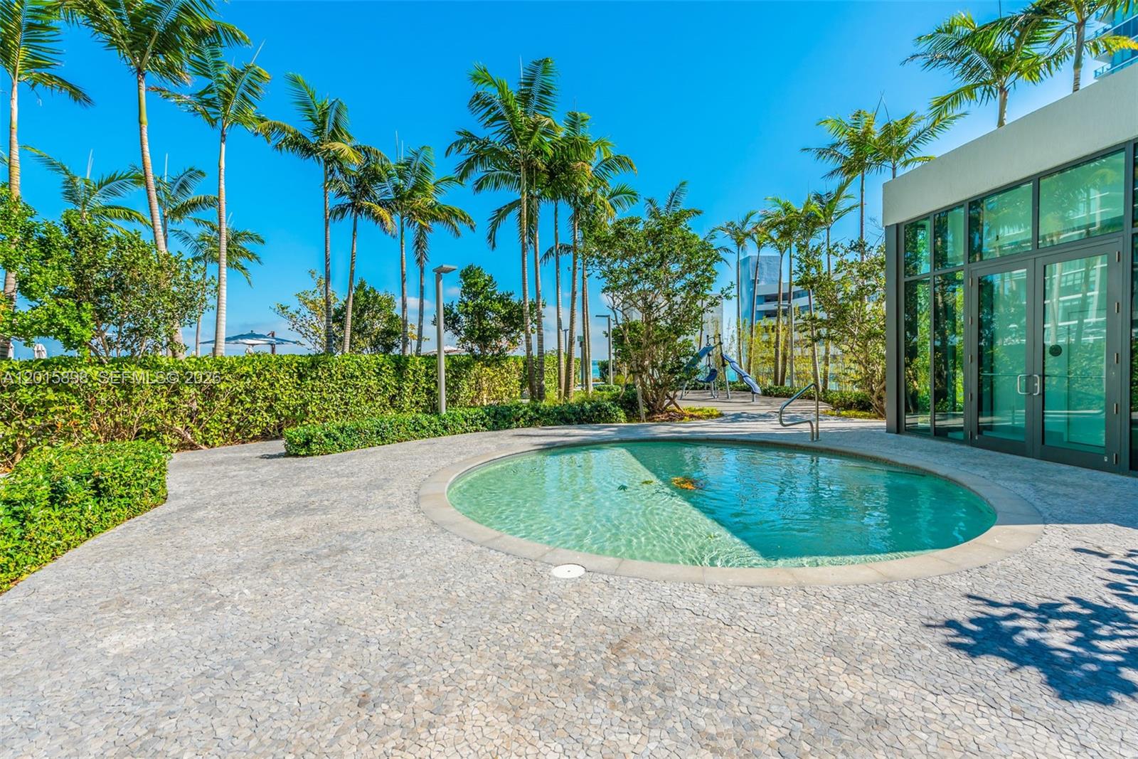480 Northeast 31st Street, Unit 1802 Miami, FL 33137 - Photo 18 of 50 a view of outdoor space yard swimming pool and patio