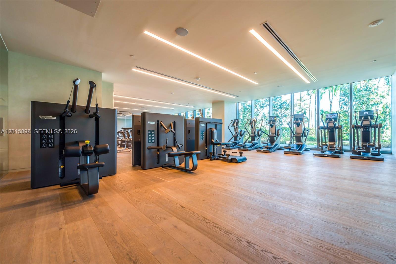 480 Northeast 31st Street, Unit 1802 Miami, FL 33137 - Photo 24 of 50 a view of a room with gym equipment