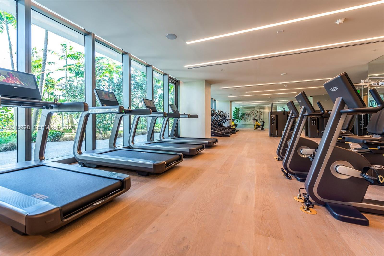 480 Northeast 31st Street, Unit 1802 Miami, FL 33137 - Photo 28 of 50 a view of a room with gym equipment