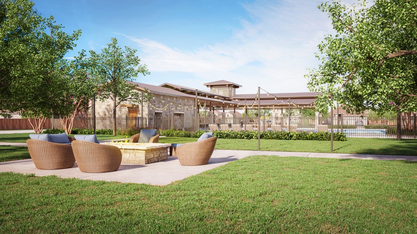 200 Hidalgo Lane Elgin, TX 78621 - Photo 22 of 25 View of home's community featuring a patio area