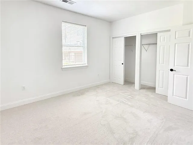 an empty room with a natural light