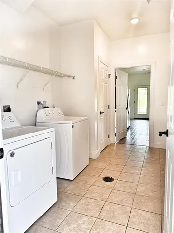 a room with dryer and washer