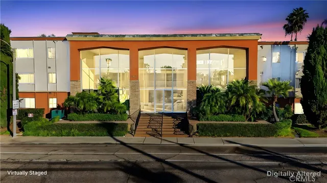 a view of front door and small yard