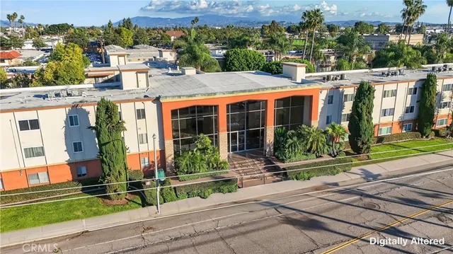 an aerial view of a city with lots of residential buildings
