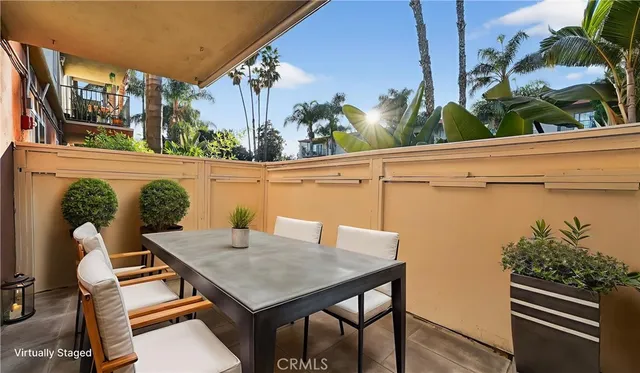 a view of balcony with furniture