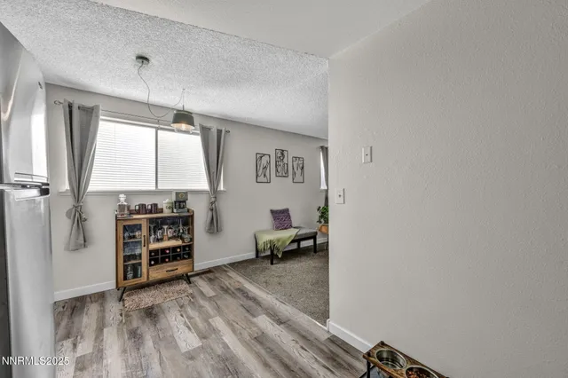 a view of a bedroom with a window