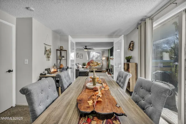 a view of a living room and dining room
