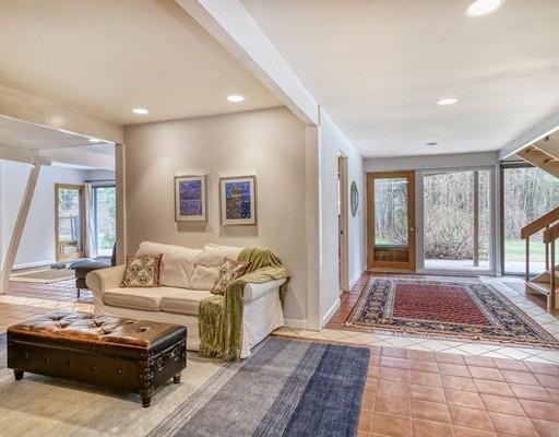 12 Meadowbrook Road Lincoln, MA 01773 - Photo 17 of 30 a living room with furniture and a large window