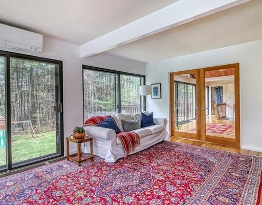 12 Meadowbrook Road Lincoln, MA 01773 - Photo 8 of 30 a living room with furniture and large windows