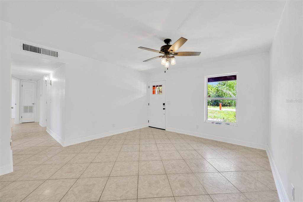 9935 River Drive Gibsonton, FL 33534 - Photo 12 of 29 a view of an empty room with a window