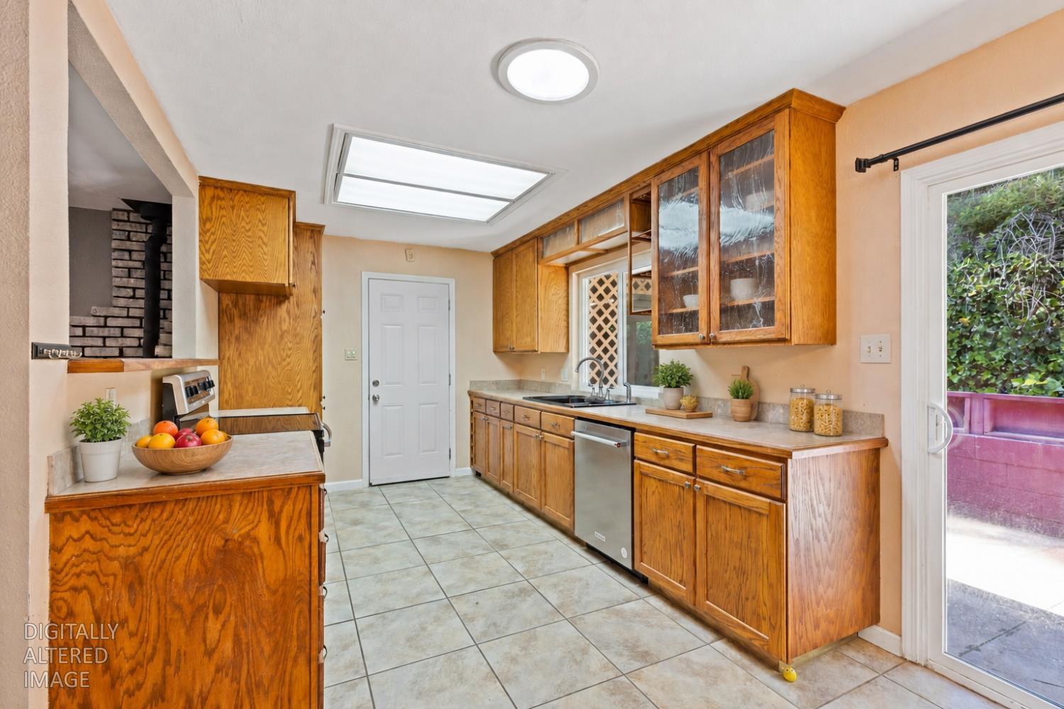 2971 Letitia Avenue Placerville, CA 95667 - Photo 7 of 65 a kitchen with stainless steel appliances granite countertop a sink and cabinets