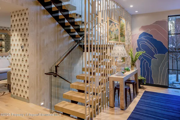 a view of entryway with wooden floor