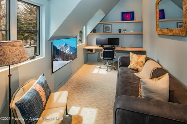 a backyard of a house with seating space