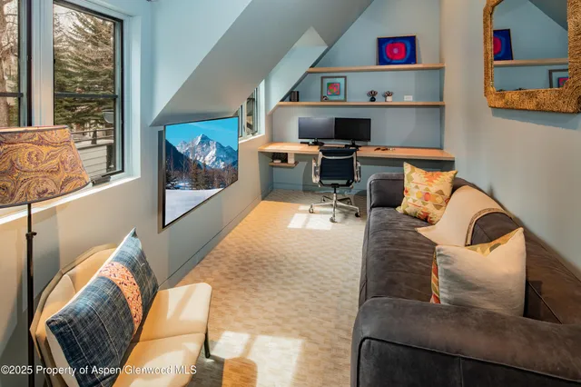 a backyard of a house with seating space