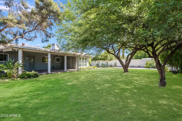 a view of a house with a garden