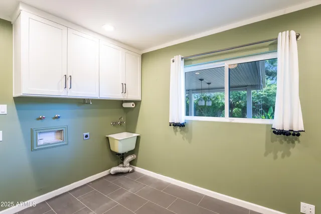 a view of a small space with a large window