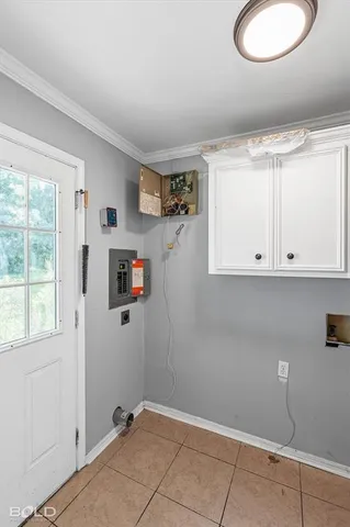 a view of a kitchen with wooden floor and window