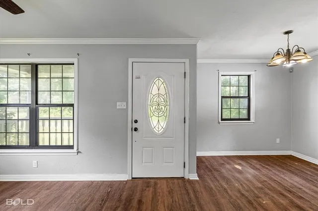 an empty room that has a window