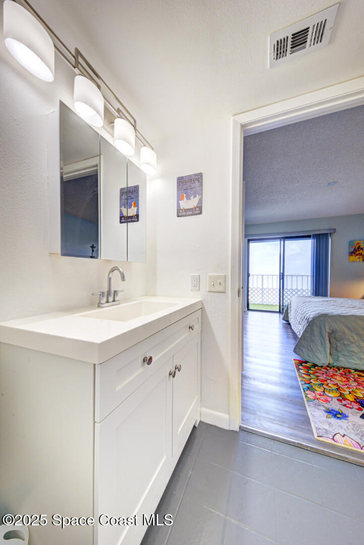 190 Seminole Lane, Unit 503 Cocoa Beach, FL 32931 - Photo 14 of 31 master bathroom vanity