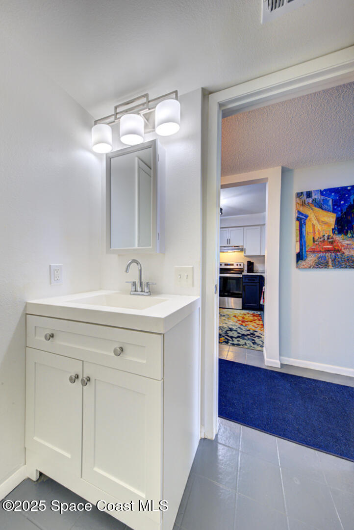 190 Seminole Lane, Unit 503 Cocoa Beach, FL 32931 - Photo 16 of 31 bathroom 2 vanity