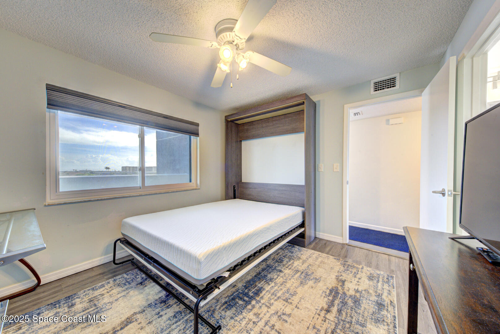 190 Seminole Lane, Unit 503 Cocoa Beach, FL 32931 - Photo 17 of 31 bedroom 2 with Murphy bed
