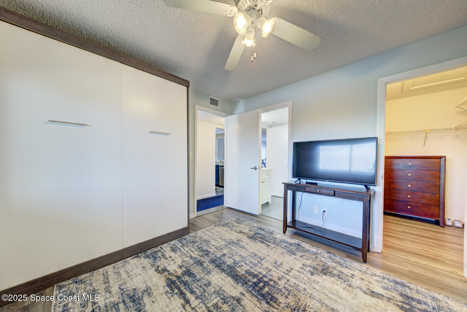 190 Seminole Lane, Unit 503 Cocoa Beach, FL 32931 - Photo 18 of 31 bedroom 2 with walk-in closet