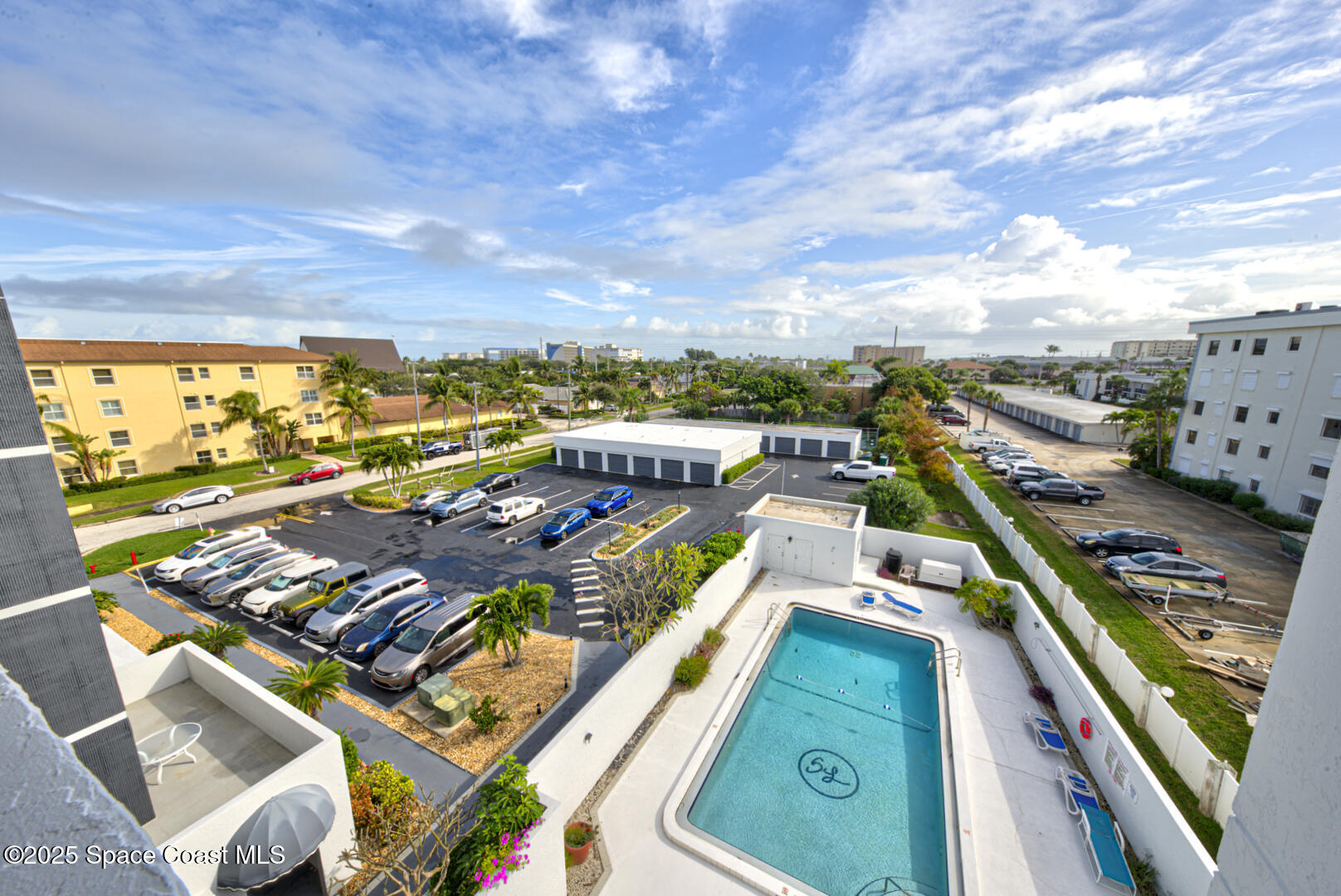 190 Seminole Lane, Unit 503 Cocoa Beach, FL 32931 - Photo 26 of 31 front walkway view of pool