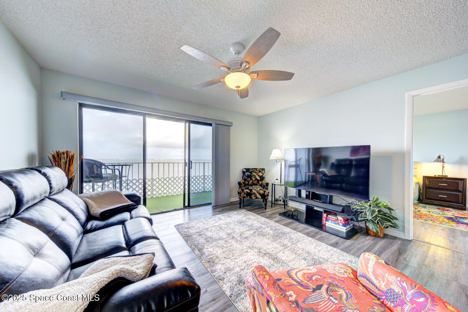 190 Seminole Lane, Unit 503 Cocoa Beach, FL 32931 - Photo 6 of 31 living room with river view