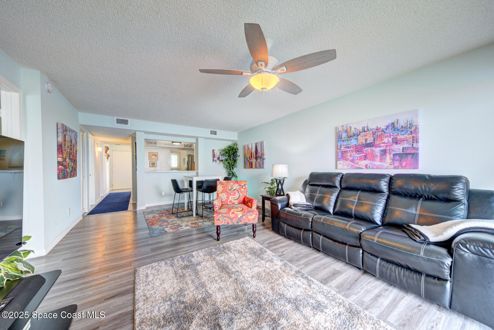 190 Seminole Lane, Unit 503 Cocoa Beach, FL 32931 - Photo 7 of 31 living room & dining room