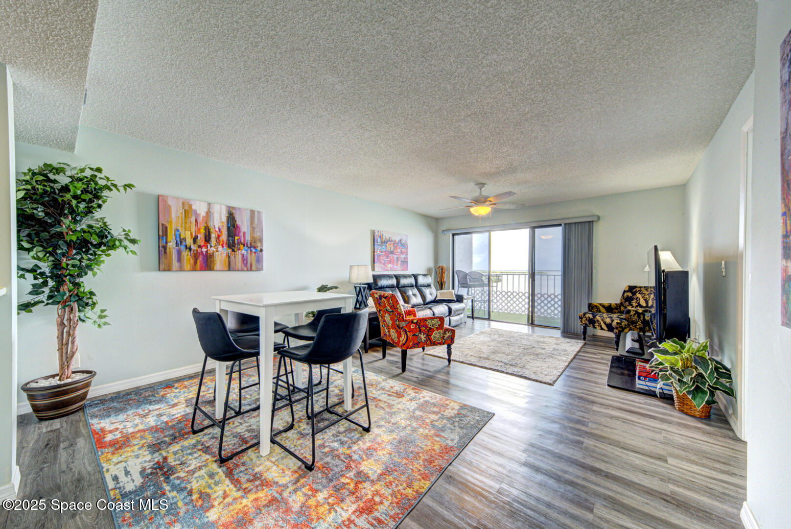 190 Seminole Lane, Unit 503 Cocoa Beach, FL 32931 - Photo 10 of 31 dining room & living room