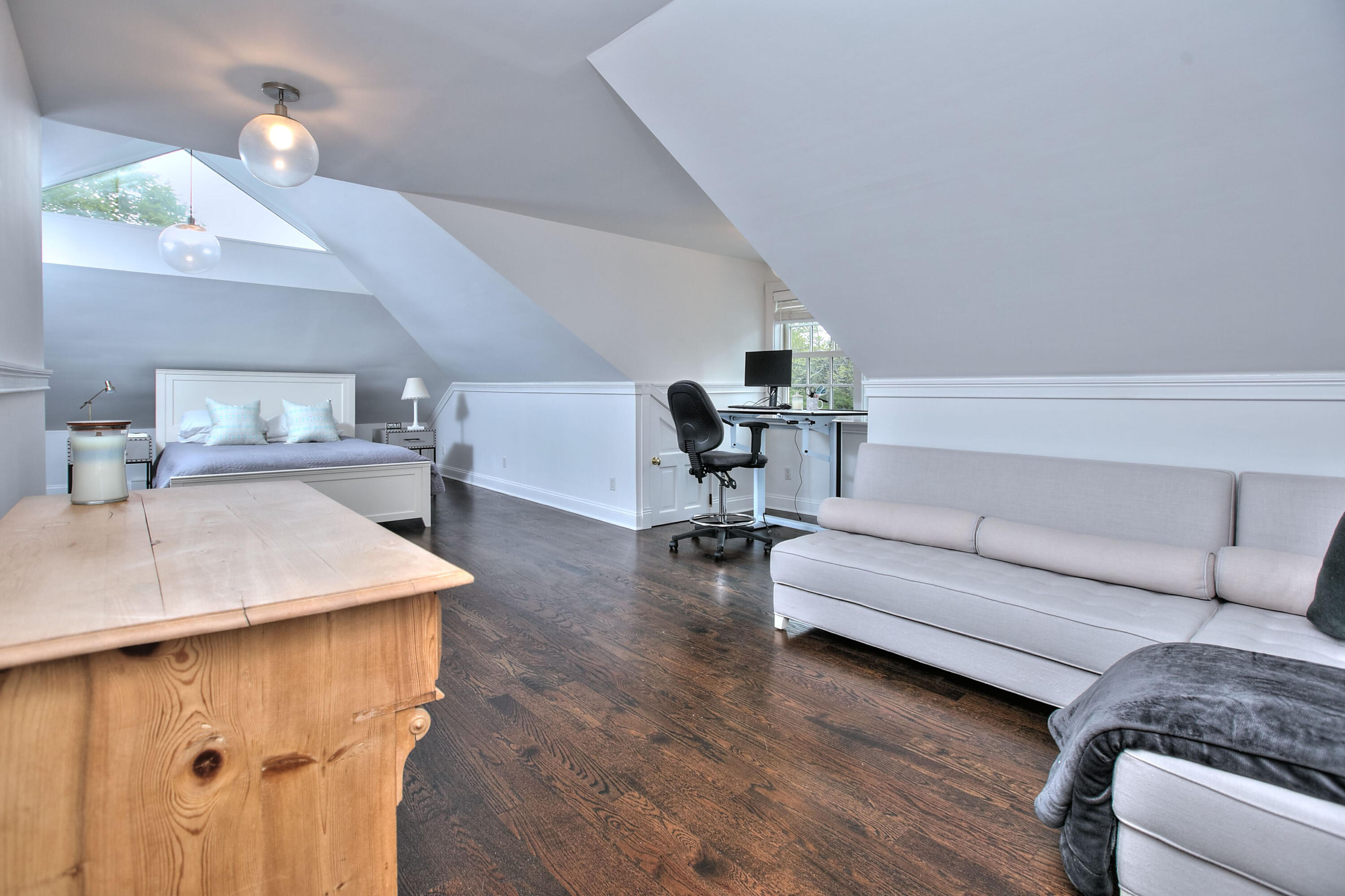 1313 Smith Ridge Road New Canaan, CT 06840 - Photo 23 of 40 a living room with furniture and a table