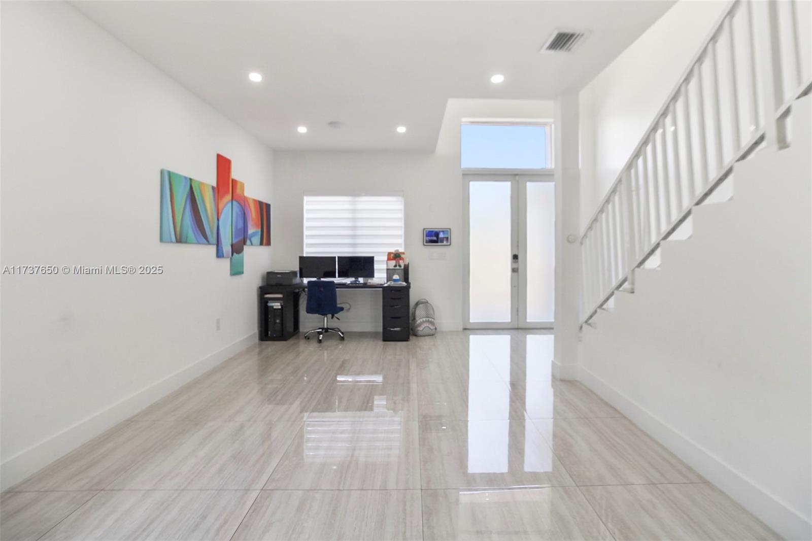 10290 Southwest 7th Terrace Sweetwater, FL 33174 - Photo 14 of 58 a view of entryway and kitchen