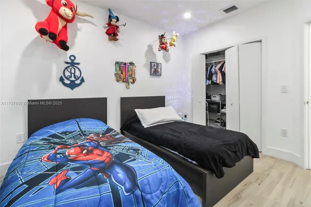 a view of living room with furniture and ceiling fan
