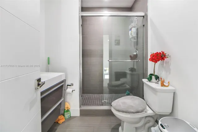 a view of a patio with table and chairs