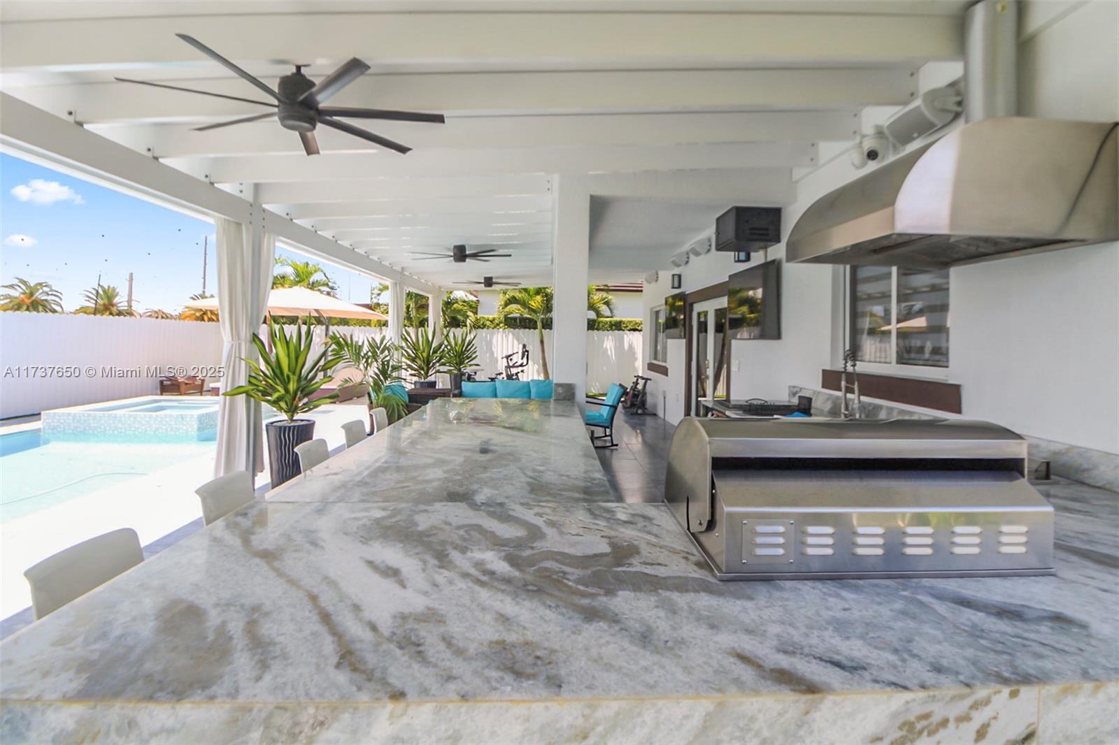 10290 Southwest 7th Terrace Sweetwater, FL 33174 - Photo 34 of 58 a view of living room with furniture and ceiling fan