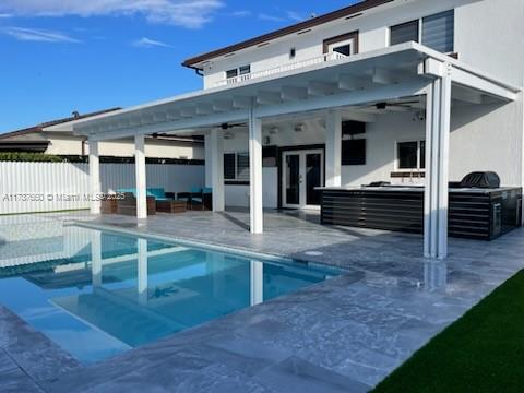 10290 Southwest 7th Terrace Sweetwater, FL 33174 - Photo 51 of 58 a view of a patio with table and chairs