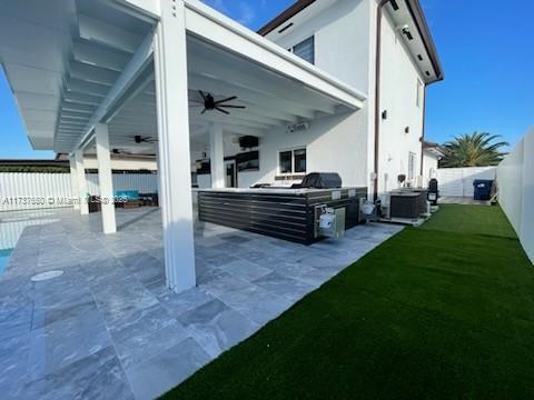 10290 Southwest 7th Terrace Sweetwater, FL 33174 - Photo 52 of 58 a view of living room kitchen with table and chairs